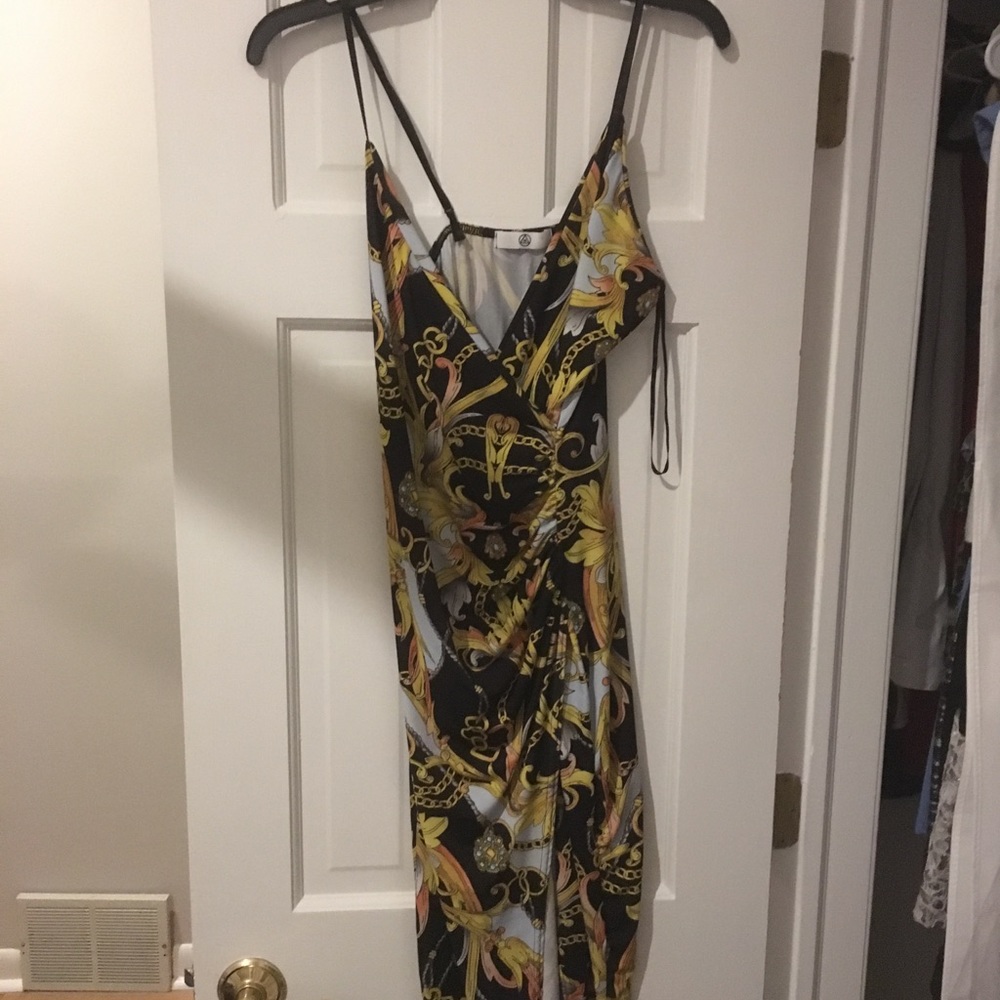 Black and gold cocktails dress